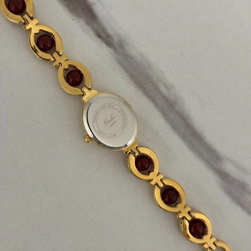 SKU:0110 cute gold burgundy mini watch gold bracelet burgundy stone +in gift bag